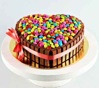 Heart shape gems and kitkat cake